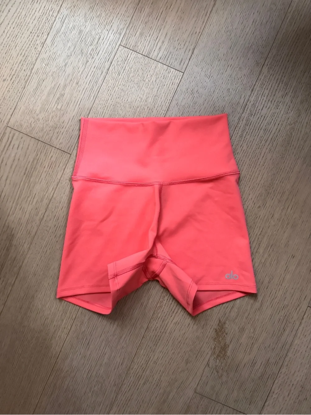 ALO Yoga High-Waist Bike Shorts in Coral Pink